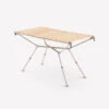 Quechua TABLE DE CAMPING COMPACTE 4/6 PERSONNES - PLATEAU BOIS - POCHE DE RANGEMENT 1 Quechua TABLE DE CAMPING COMPACTE 4/6 PERSONNES - PLATEAU BOIS - POCHE DE RANGEMENT -Avontuur Uitrusting table de camping compacte 46 personnes plateau bois poche de rangement